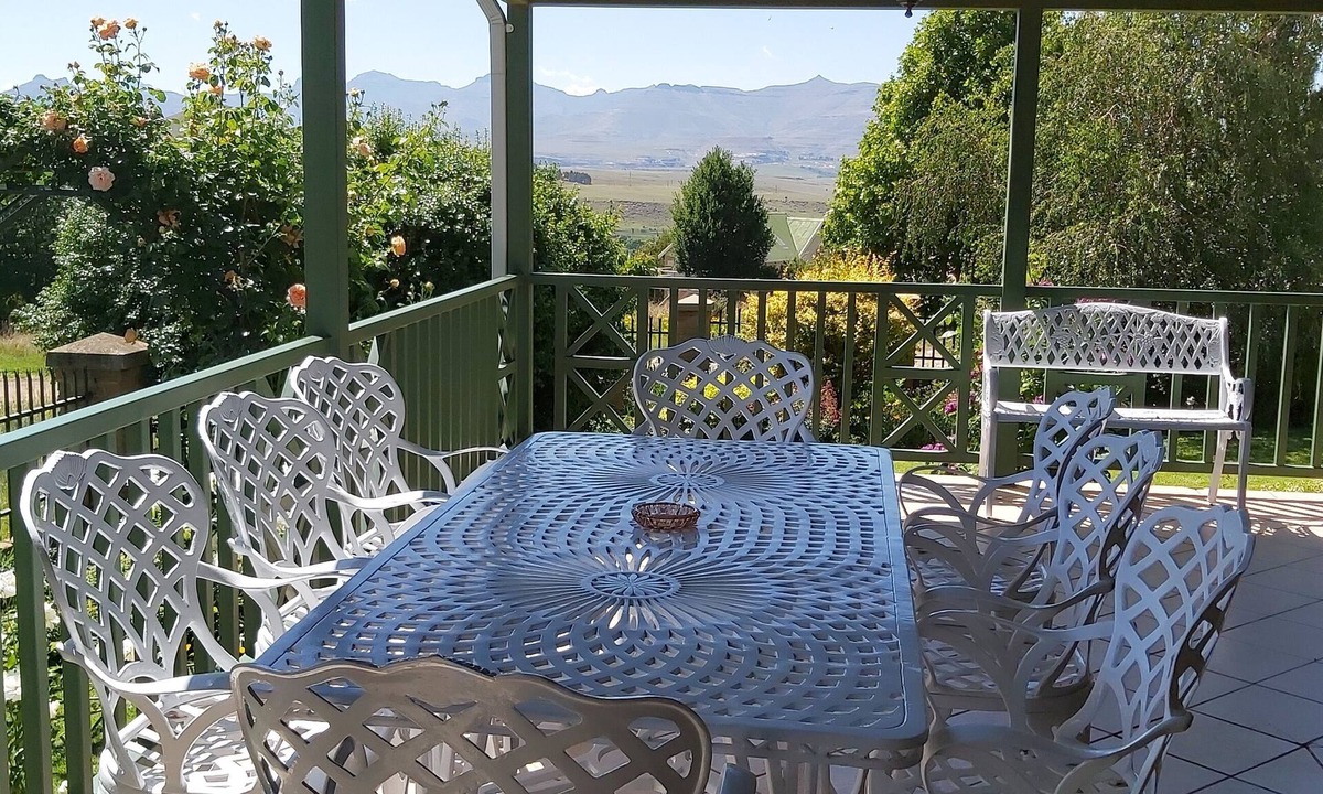 Clarens House | Holiday house priced per bedroom - 4, fenced garden, great views, walk to town
