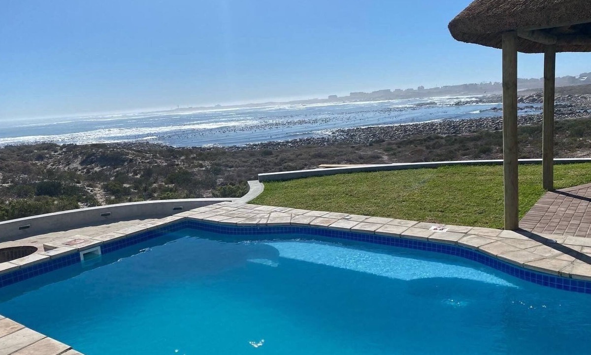 St. Helena Bay Villa | Large villa with warm pool on the beach