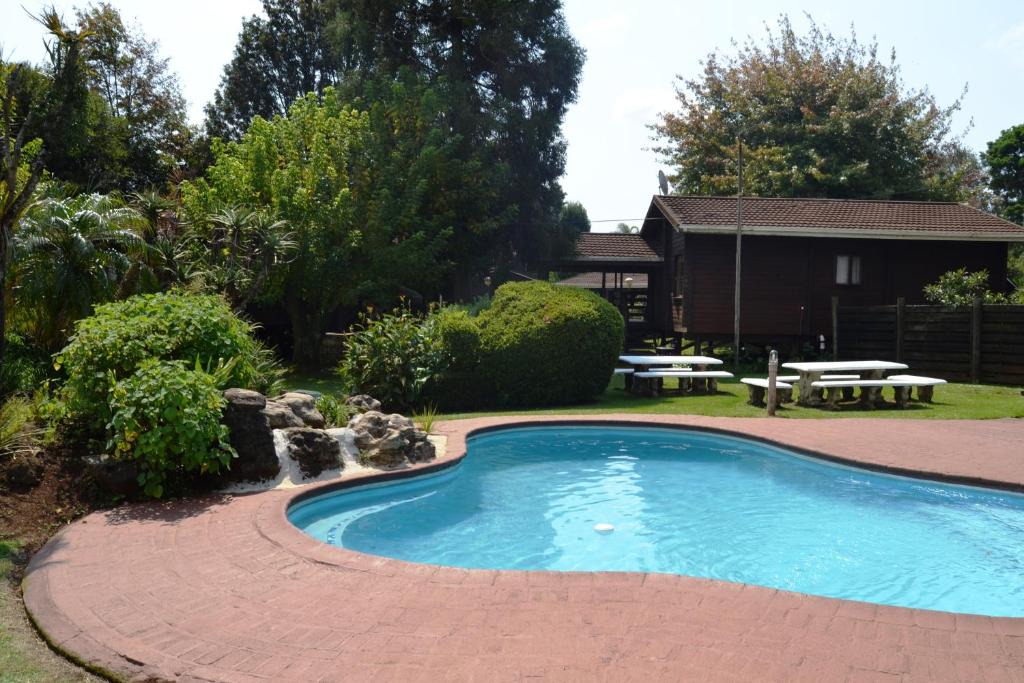 Graskop Resort | Log Cabin & Settlers Village
