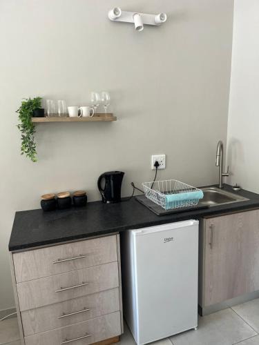 George Apartment | Pebbles