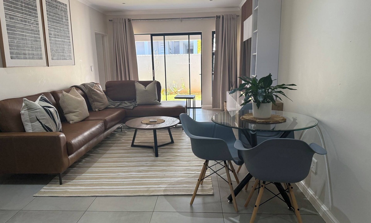 Greater Johannesburg Metropolitan Area Apartment | Sandton 2-Bed with Garden near Sandton City & Gautrain. For Business & Leisure.