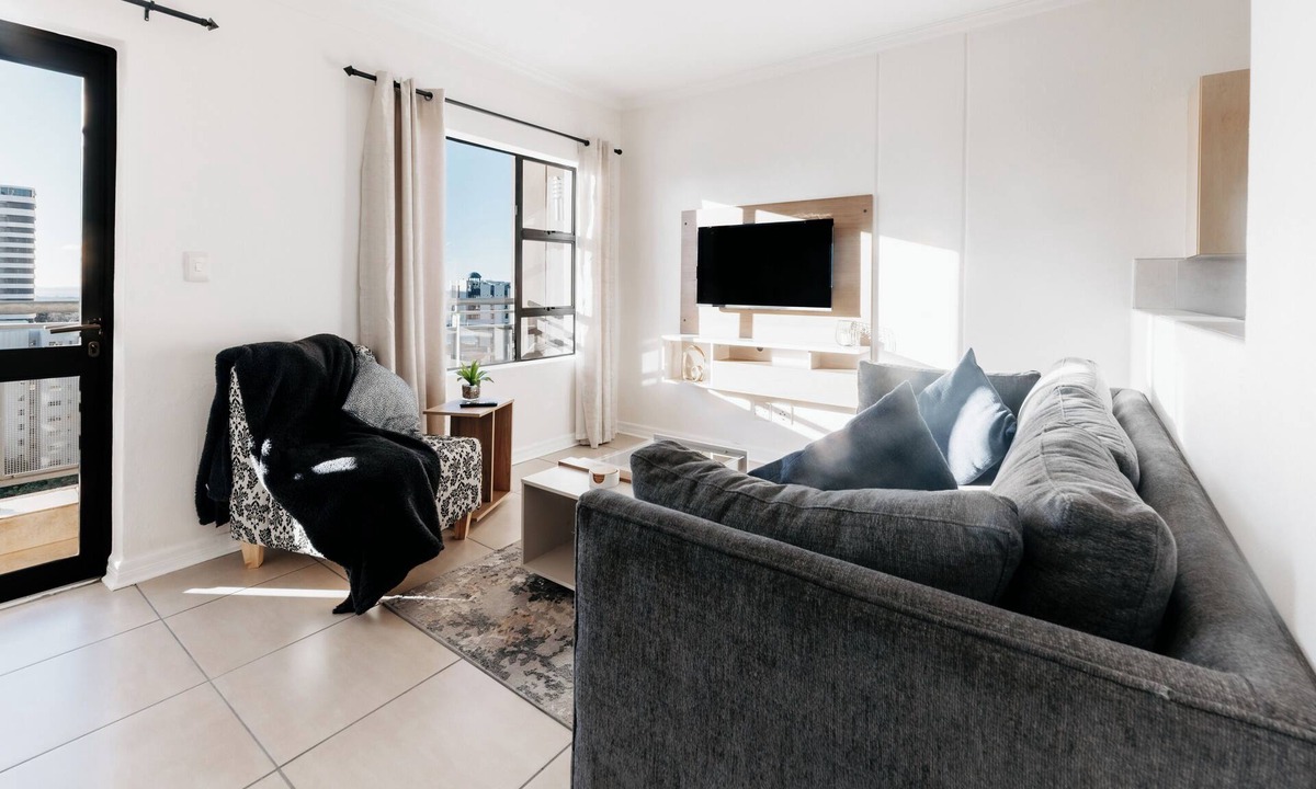Greater Johannesburg Metropolitan Area Apartment | Stylish Sandton Retreat. Walk to Sandton City. Pool Access Included