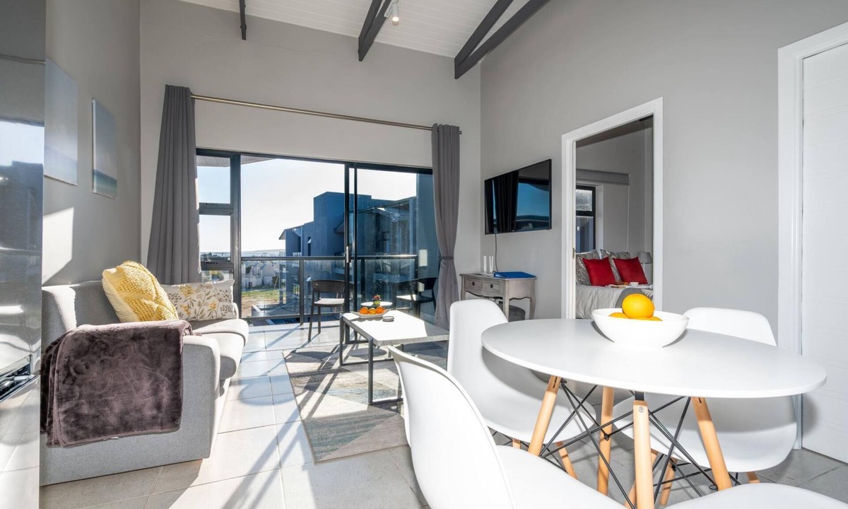 Mykonos Apartment | Stylish Urban Stay | Balcony | Lagoon View