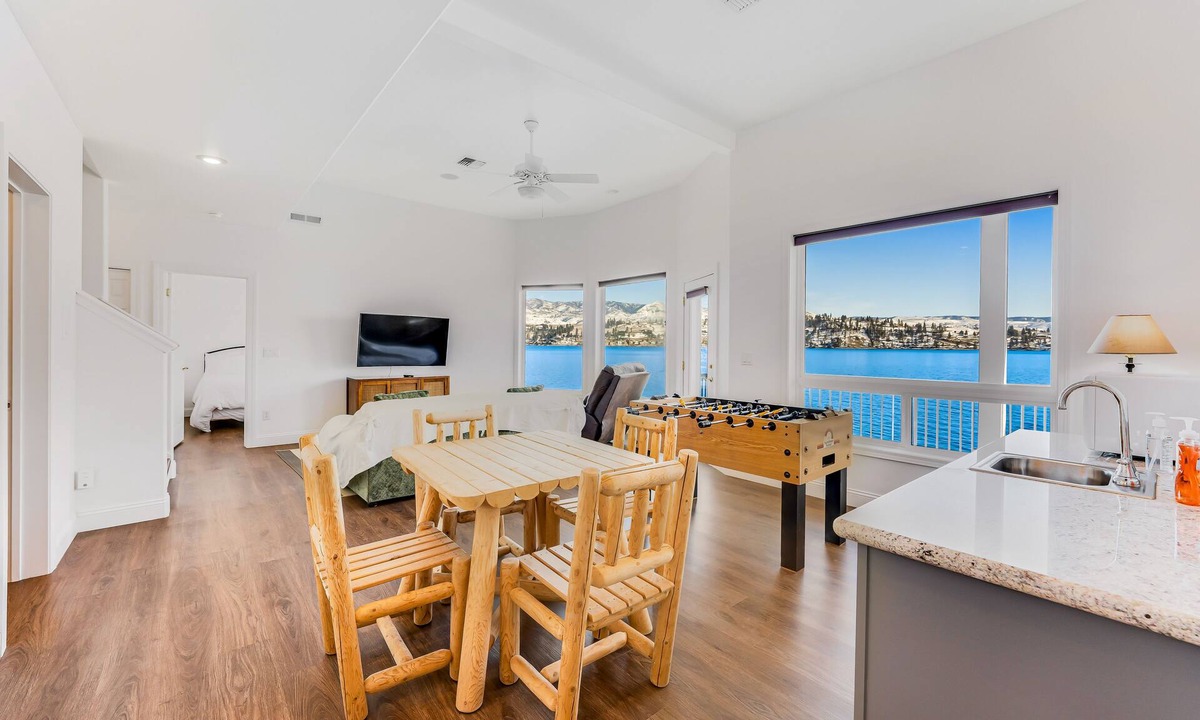 Manson House | Upscale lakefront house with stunning views & dock spacious interior with fireplace