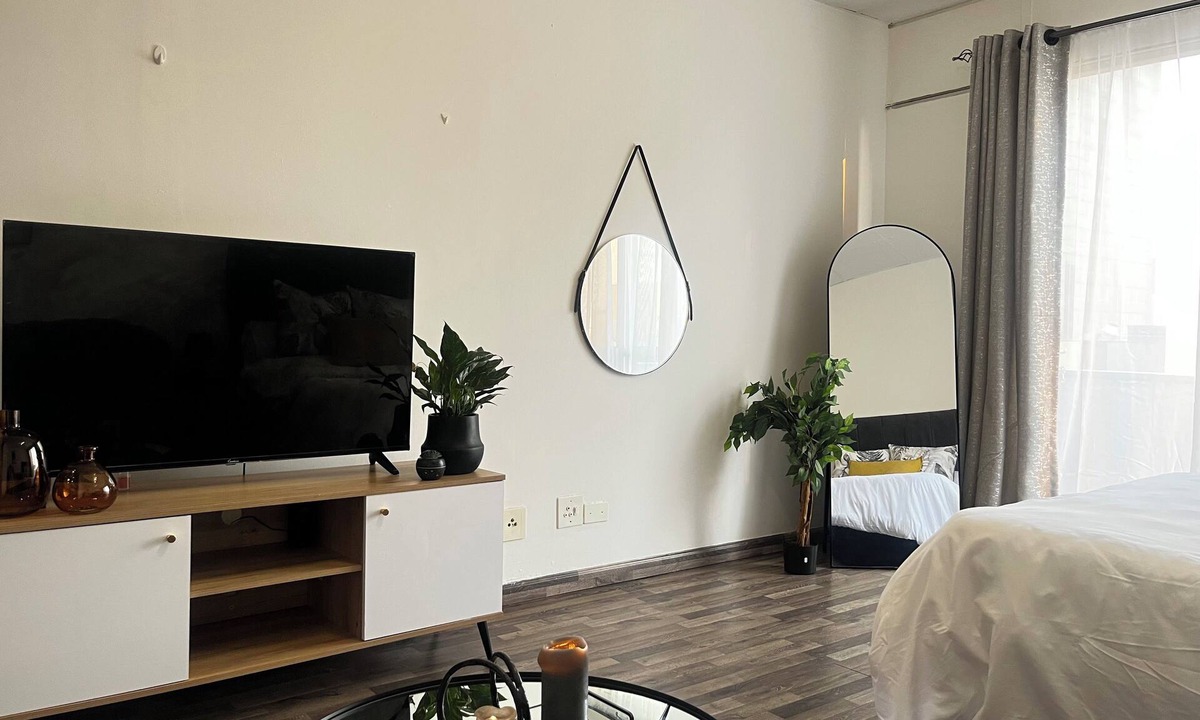 Downtown Johannesburg Apartment | Urban energy meets secure comfort in a historic landmark.