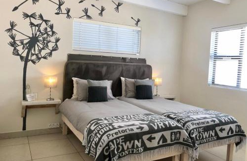 Bloubergstrand Hostel | At Rosies KiteHouse - Private rooms week to week, Monday to Monday
