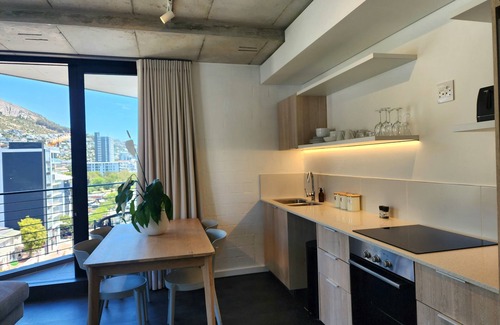 Sea Point Apartment | New Seapoint 1-Bed with Sweeping Mountain Views