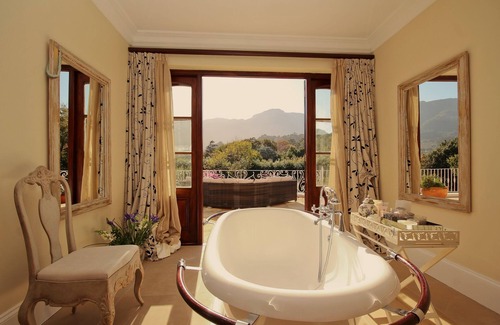 Constantia Villa | The Constantia nestles among vineyards with spectacular mountain views.