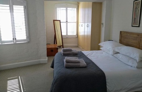 Scott Estate Apartment | The Village apartment with beach and mountain views