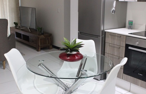 Greater Johannesburg Metropolitan Area Condo | Two bedroom ground floor condo unit with private garden, 5 min from Monte Casino