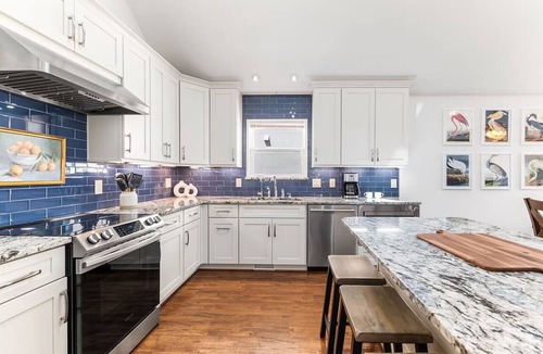 Butler Beach House | 2 Min. Walk to Beach/Ocean Views/Hot Tub/Game Room/Bikes/In-Law Suite