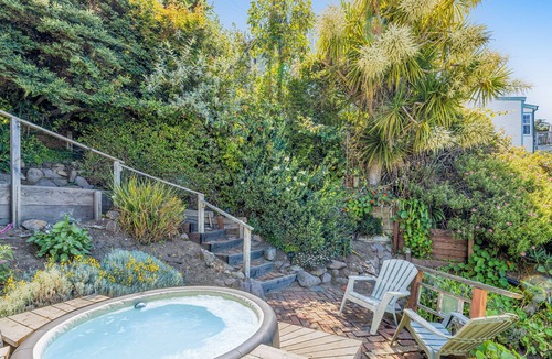 Old Town Cottage | Adorable waterfront cottage with private hot tub, deck, & wood stove