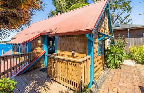 Old Town Cottage | Adorable waterfront cottage with private hot tub, deck, & wood stove