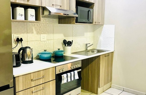 Greater Johannesburg Metropolitan Area Condo | Alice's Place -Power Back Up- Pool & Cinema & More in vibrant Johannesburg