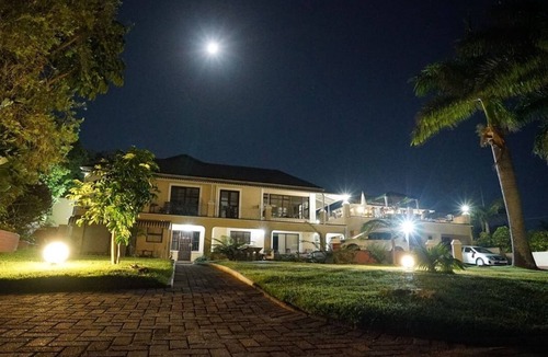 Margate Apartment | Apartment in large tropical garden with pool and sea view