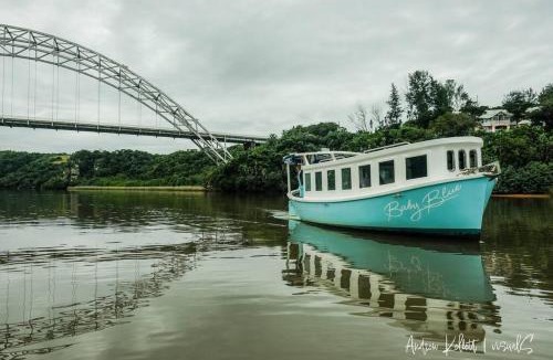 Mzamba Beach Boat Rental | Baby Blue Houseboat