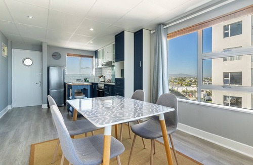 Flora Park Apartment | Beachfront Bliss with Pool & Ocean Views