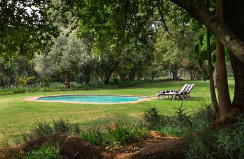 Hekpoort House | Bridgewaters Horse Park Poolside Rondawel