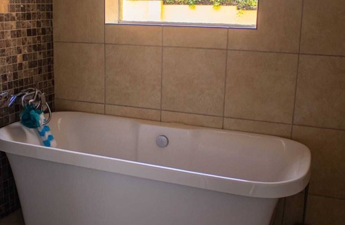 Lombardy East House | Bring the whole family to this spacious 4-bedroom house that sleeps 8.