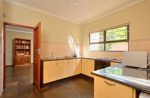 Centurion House | Centurion Golf Suites Boca Walk