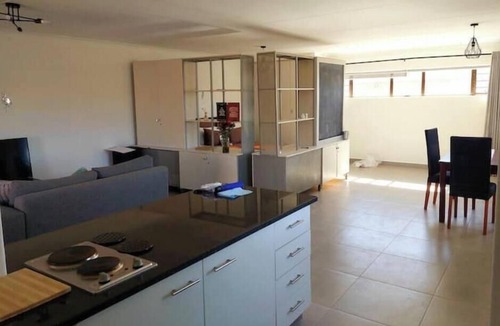 Houghton Estate Apartment | Chic 1-bedroom with WiFi and fitness room in vibrant Johannesburg
