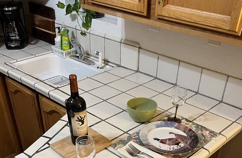 West Sacramento Cottage | Close to downtown, with beautiful gardens, sparkling pool & private entry