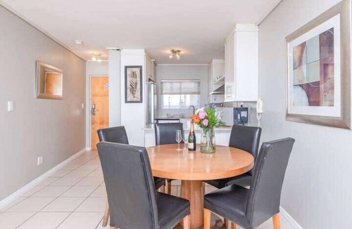 Lagoon Beach Apartment | Coastal Escape with Stunning Mountain Backdrop