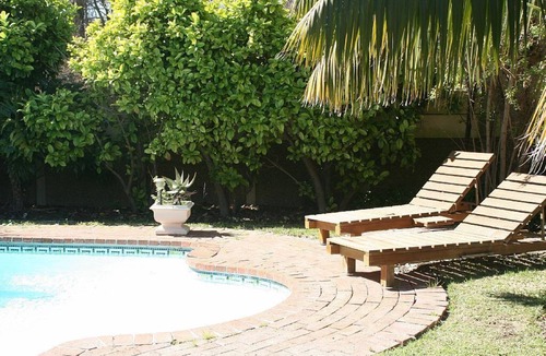 Constantia Cottage | Constantia Lazy River, Froggs Leap studio for 2 people and 2 small kids on sofa