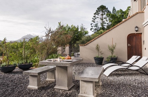 Stellenbosch Apartment | Enjoy the privacy of your own wood fired hot-tub, barbecue & breathtaking views.