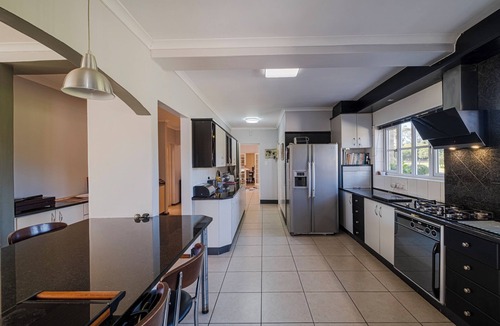 Port Elizabeth Villa | Exclusive villa with pool, tennis court and beautiful garden in natural setting