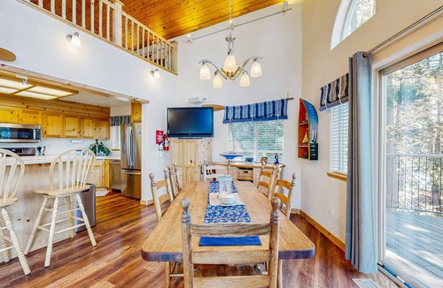 Serene Lakes House | Family-friendly, lakefront getaway with a gas fireplace, furnished deck, & views