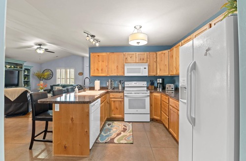Moab South Valley House | Fresh, luxurious 4-BR home! Fenced yard with BBQ, Community Pool & Hot Tub