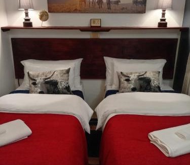 Strand House | Hibiscus Cottage