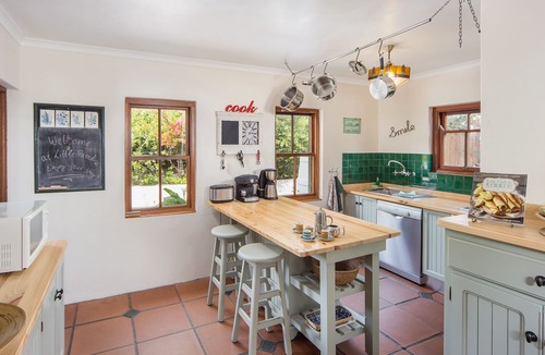 Noordhoek House | Holiday house with sea and mountain views and a large garden