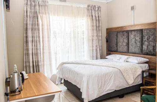 Welkom House | Kololo at 399 Guesthouse & Conference