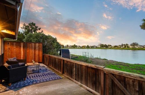 East San Mateo Apartment | Lakefront 2BR Lavender Home with Patio and Water Views