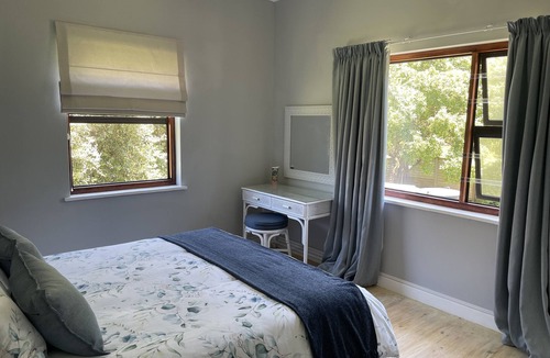 Wilderness House | Light airy home seconds from the beach.