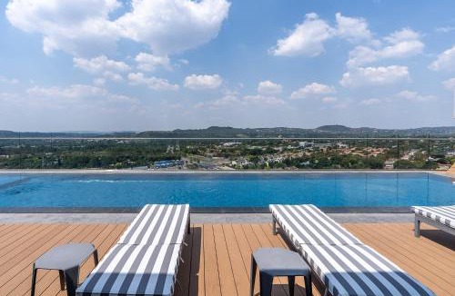 Menlyn Apartment | Luxurious Menlyn Maine 1 Bedroom on 12th Floor with Stunning Views & No Load Shedding