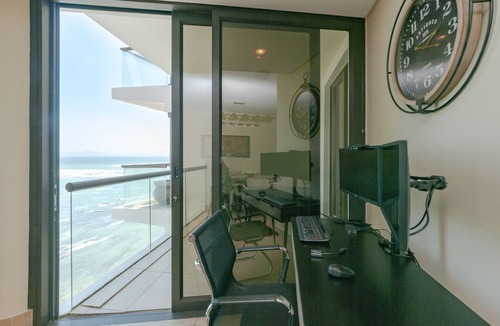 Strand Apartment | Luxury Remote Working Ocean View 1203. UPS
