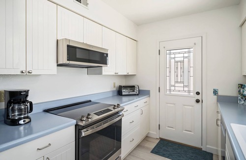 Park Hill House | Magical Home on the Hill with Ocean Views - two Queen beds and one full bed