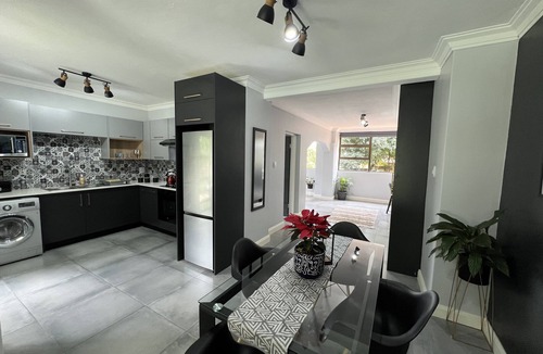 Pretoria Apartment | Modern 4 sleeper private suite and access to beautiful garden and swimming pool