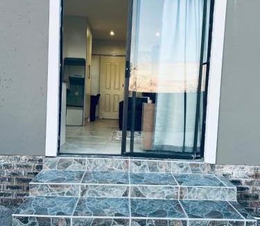 King William's Town Apartment | Modern & Cosy Apartments with Scenic Sunset Views