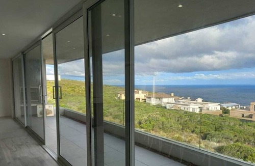 Pinnacle Point House | Modern, cozy house located in award winning golf estate with wood-fired hot tubs