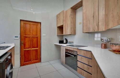 Greater Johannesburg Metropolitan Area House | Modern & Spacious 4 Bed, Home in Heart of Sandton!