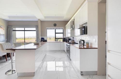 Sunset Beach Villa | On 8th Green Worthing Villa