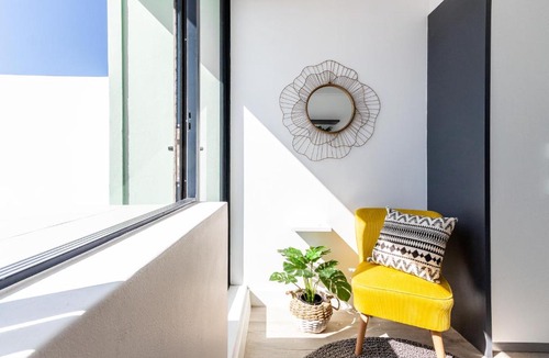 Cape Town City Centre Apartment | One On Albert -Vibrant Woodstock Apartment with Private Patio Area