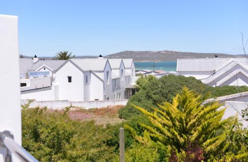 Langebaan House | Pelican Cove is a Modern 4-Bedroom Holiday Home in Langebaan with some Sea Views