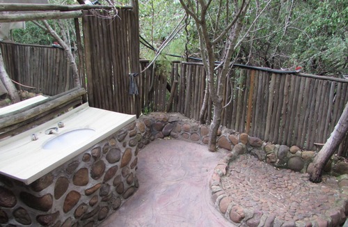 Thorny Bush Game Reserve House | Romantic canvas pad on river, share shower with monkeys and listen to the lions