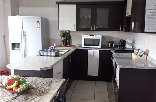Benoni House | Rustic Red Self catering country life close to OR Tambo International