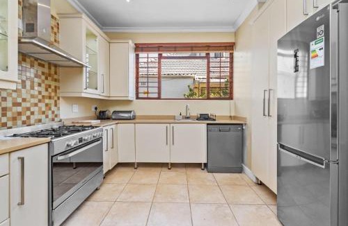 Claremont House | Spacious Claremont Home with Pool Fireplace